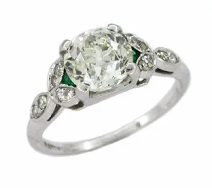 Antique 1.60 Carat Old Mine Cut Diamond and Side Emerald Platinum Engagement Ring