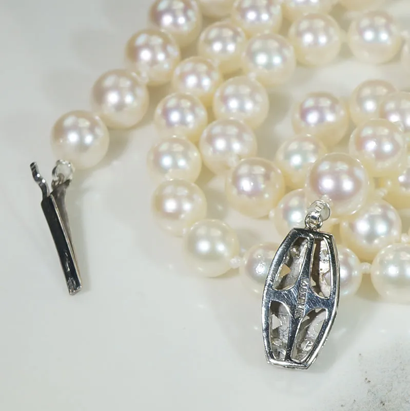 Matinee Length Pearl Necklace with Decorative Diamond Clasp